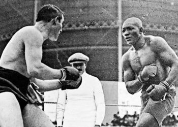 Today in Sports History: African-American boxer Jack Johnson stops Canadian defending champion Tommy Burns to become first black man to win world heavyweight title