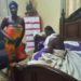 Photos: How angry wife compels husband’s side-chick to clean her home after catching them red-handed in bed