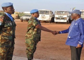 Ambassador, Maj Gen Francis Adu-Amanfoh (R) congratulating Lt Col Winston Luck Kweku Djiyehue for being the chosen one