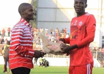 Photo: Player receives live chicken for being Man-of-the-match in Malawi