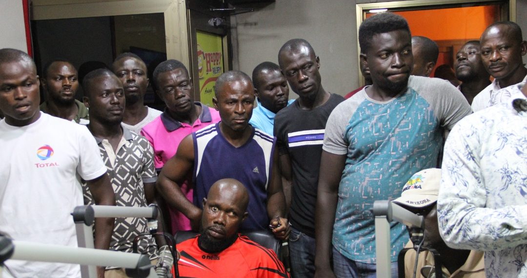 Photos + Video: Taxi Drivers storm premises of Happy FM over alleged assault on colleague by city guard