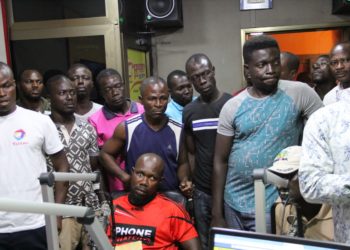 Photos + Video: Taxi Drivers storm premises of Happy FM over alleged assault on colleague by city guard