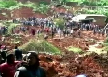 Dozens trapped underground after deadly landslide