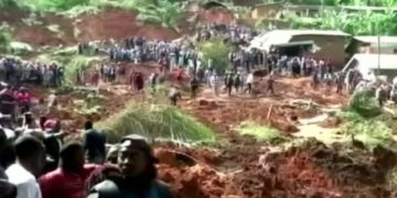 Dozens trapped underground after deadly landslide