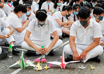 Hundreds join sit-in at school of shot Hong Kong protester
