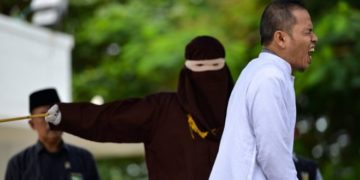 Indonesian man who helped set strict adultery laws flogged for adultery