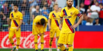 Lionel Messi reacts after Levante’s third goal. Photograph: Javier Barbancho/Reuters