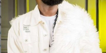 Rapper told to get degree before criticising government