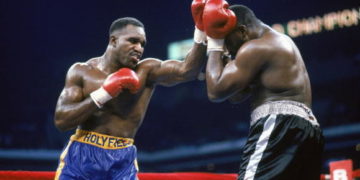 Today In Sports History: Evanda Holyfield defends WBA, IBF titles