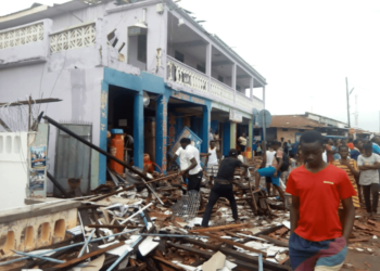 Photos: Massive rainstorm causes havoc in Somanya as workers flee offices