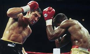 Today In Sports History: Oscar De La Hoya disciplines Ike Quartey to retain the WBC welterweight championship