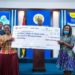 Eunice Osei-Tutu, Corporate Rations at Pernod Ricard Presenting the Cheque