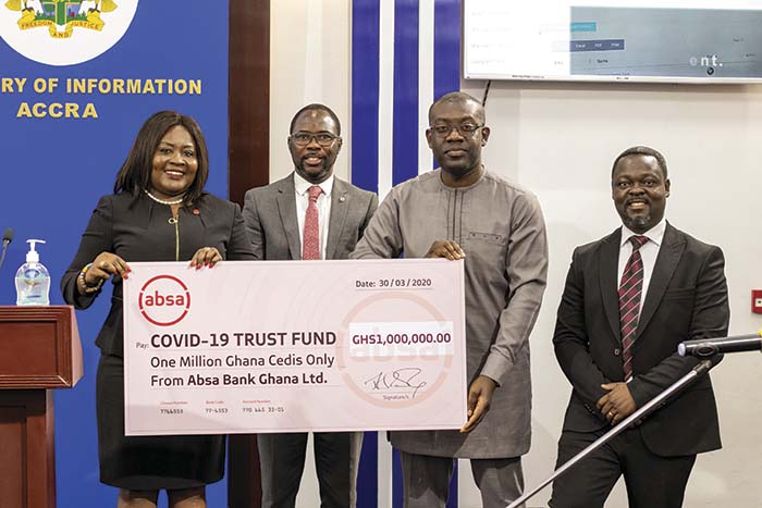 Officials of Absa Bank Ghana making the presentation to the COVID19 Fund