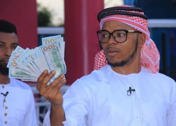 Obinim flaunts dollar notes as he celebrates release from police custody