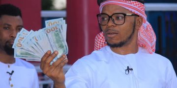 Obinim flaunts dollar notes as he celebrates release from police custody