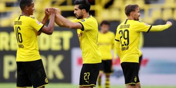 Dortmund beat Hertha to maintain faint title hopes
