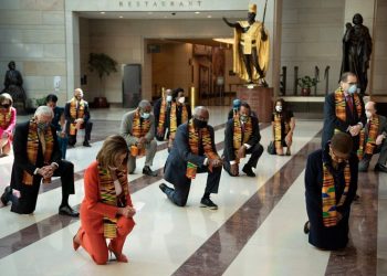 Democrats hold memorial for George Floyd, ‘take a knee’ in beautifully adorned kente