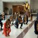 Democrats hold memorial for George Floyd, ‘take a knee’ in beautifully adorned kente