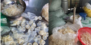 Police seize 324,000 used condoms being washed and resold in a raid