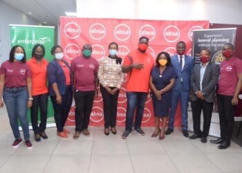 Officials of Absa Bank and Transitions in a group picture
