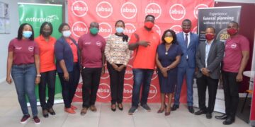 Officials of Absa Bank and Transitions in a group picture