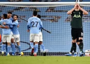 Man City go seven points clear after Spurs win