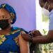 Why COVID-19 vaccinators are not wearing gloves