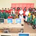A group picture of Absa employees, school authorities and students