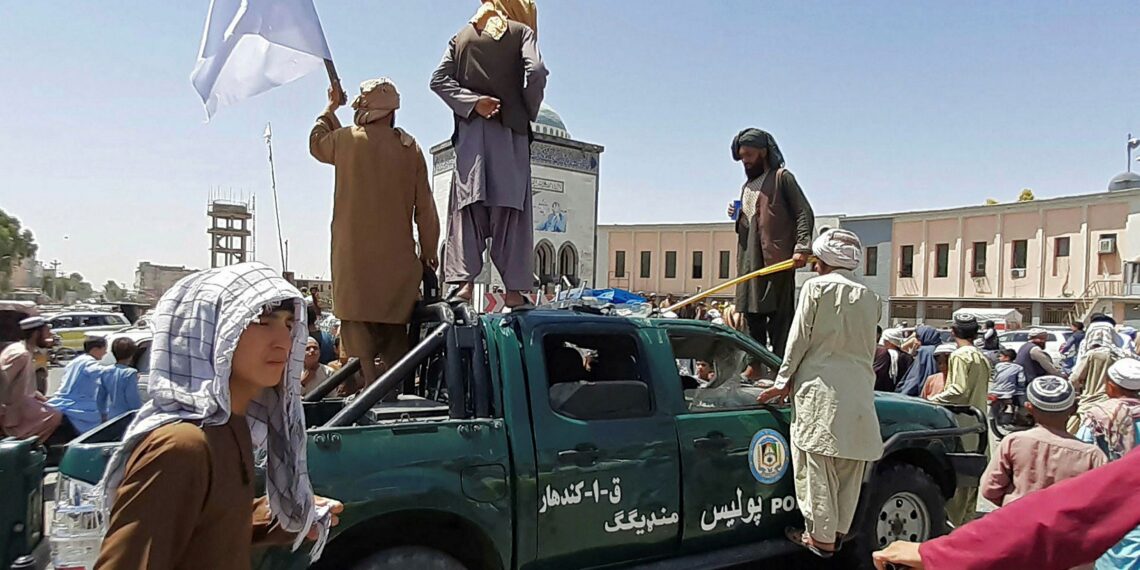 Afghans wake up to a new world as Taliban take over country