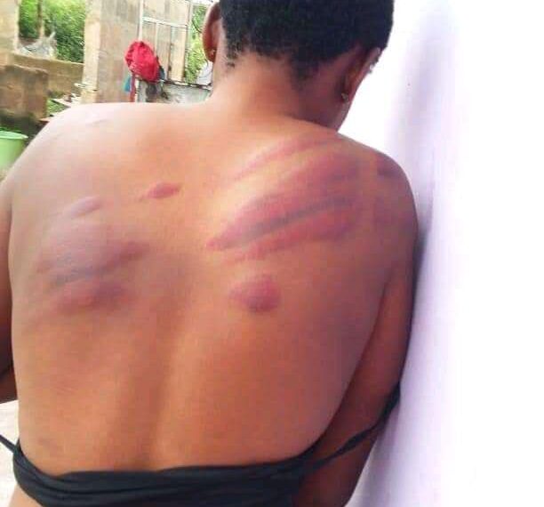 Photos: Headmaster lashes a lady to pulp for helping a colleague