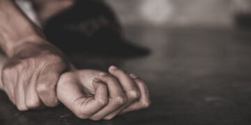 Two men defile alleged lesbian