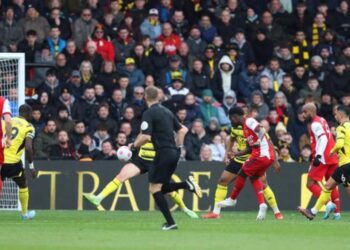 Arsenal see of Watford to go fourth