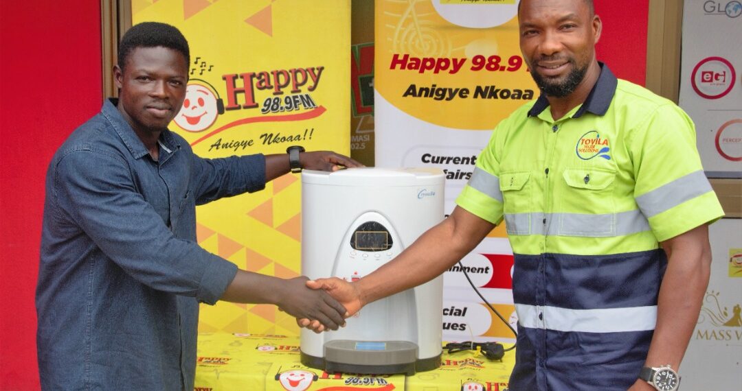 Tovila Water Solutions presents product worth Ghc5k to Happy FM’s Super Clash predict and win promo winner