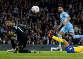 Man City back on top with victory over Brighton