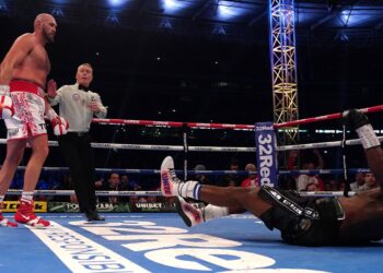 Tyson Fury knocks out Dillian Whyte to retain WBC heavyweight title in front of sell-out Wembley