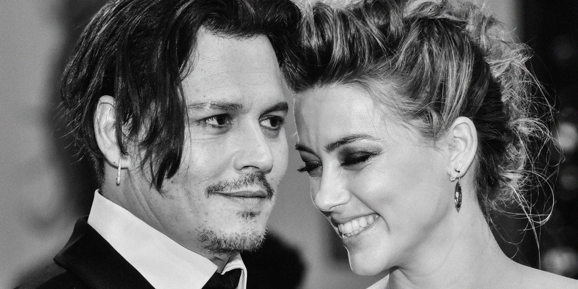 Amber Heard says she still loves Johnny Depp despite legal battle