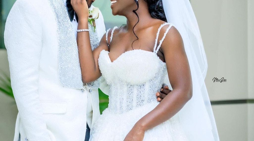 Photos + Videos: Foster Romanus ties knot with sweetheart