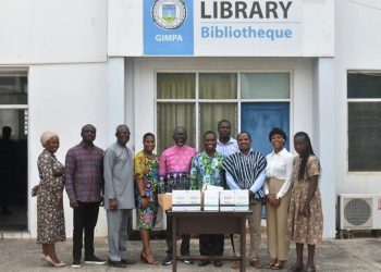 Prof. Douglas Boateng donates books to GIMPA and CISCM
