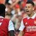 Arsenal beat Liverpool to go top of Premier League