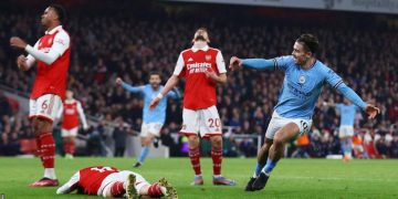 Man City go top with win over title rivals Arsenal