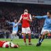 Man City go top with win over title rivals Arsenal