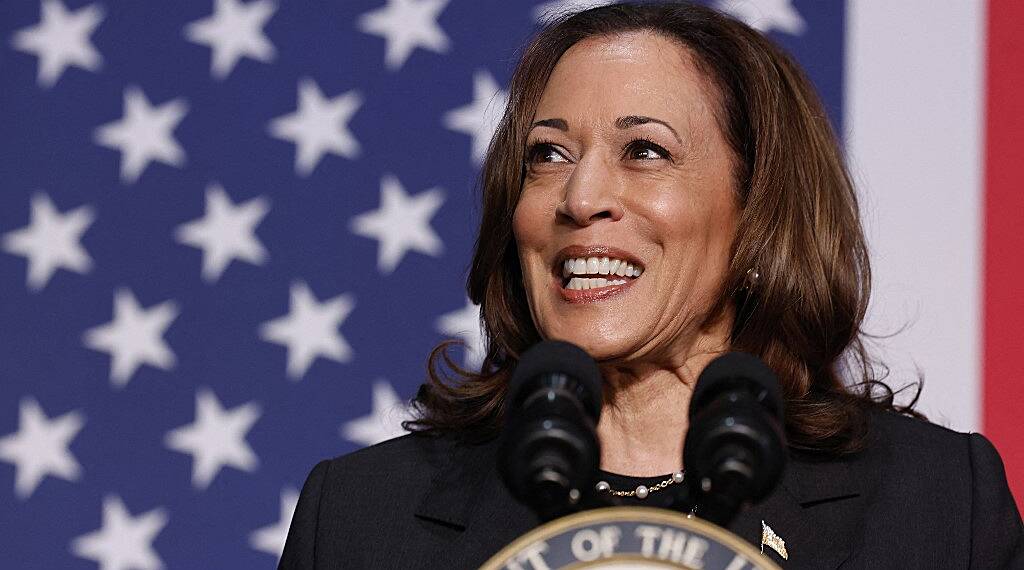 Backed by Biden, Harris moves to lock up White House bid