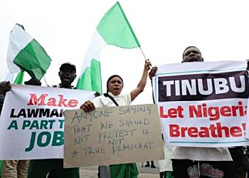 Nigerian president demands end to deadly protests