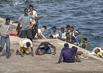 Spain to offer residency and work permits to undocumented migrants