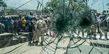 Gang attack at Haiti hospital reopening kills two journalists