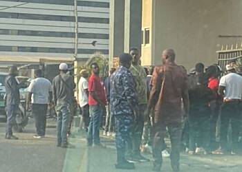 Suspected NDC supporters gather at GRA headquarters to deny Acting Boss entry