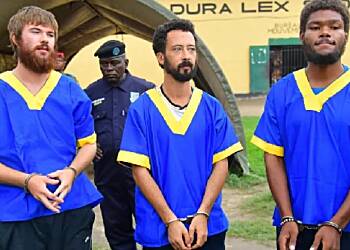 Three Americans jailed over failed DR Congo coup return home