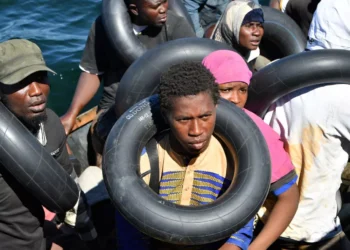 Italian NGO saves migrants thrown into rough waters by armed militia men