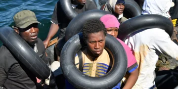 Italian NGO saves migrants thrown into rough waters by armed militia men