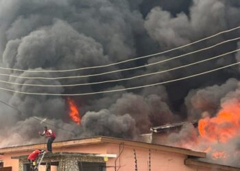 Adabraka Residents Urge Fire Service to Extinguish Lingering Warehouse Fire Amid Health Concerns